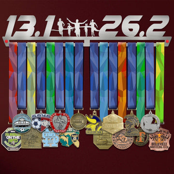 13.1 - 26.2 Running Medal Hanger Display holding colorful race medals with ribbons, ideal for runners to showcase achievements in style.