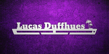 Custom images gallery medal display rack with 'Lucas Duffhues' and palm tree design, great for tropical or beach-themed achievements.