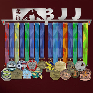 BJJ Brazilian Jiu Jitsu Medal Hanger Display V2 showcasing colorful medals on a stainless steel rack with martial arts silhouette design.