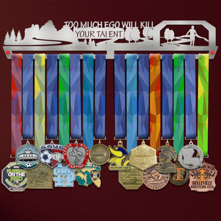 Too Much Ego Will Kill Your Talent medal hanger display holding colorful sports medals, ideal for organizing up to 48 medals.